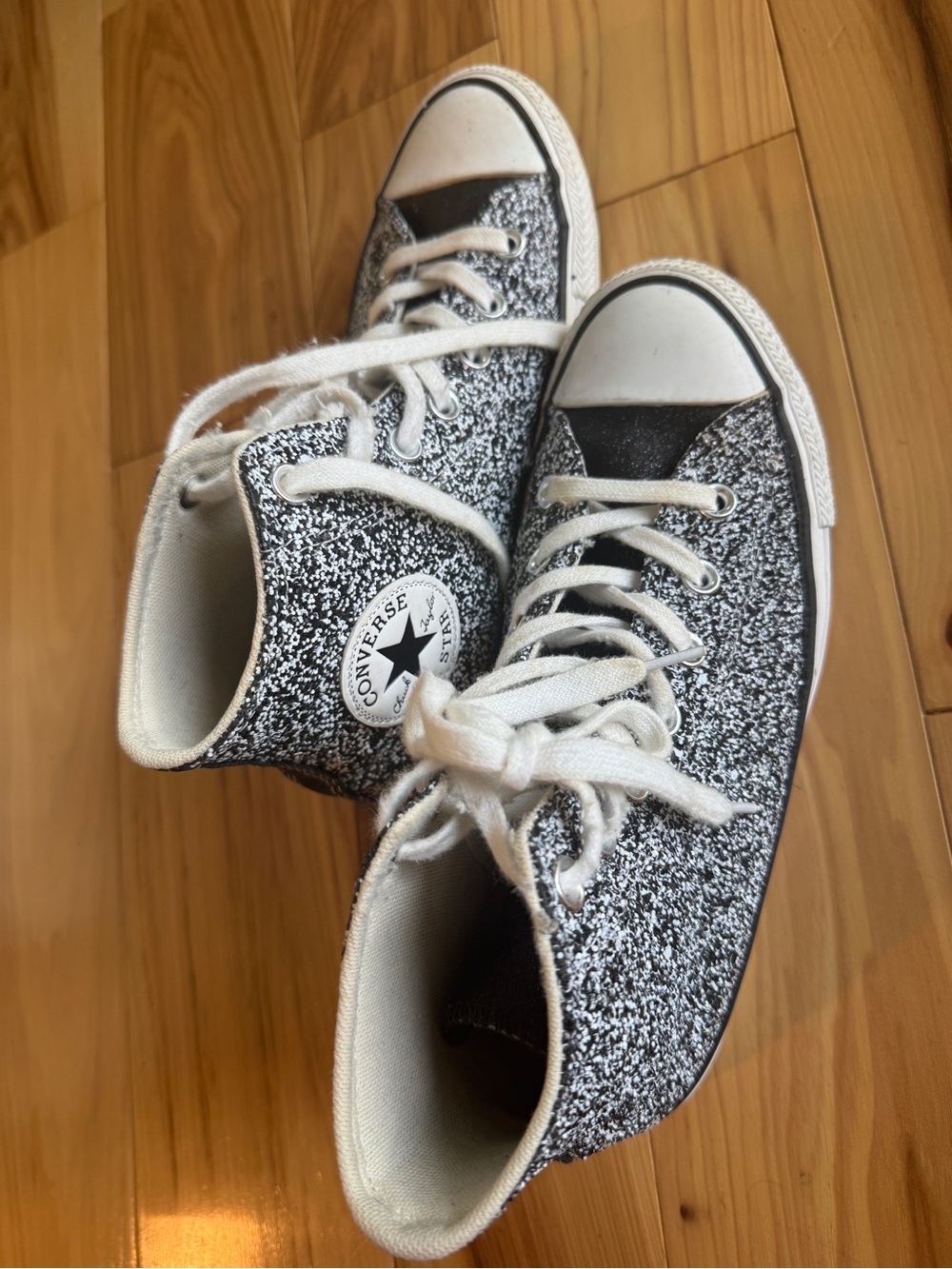 Converse women’s High Top Sneakers in Black and White Speckle